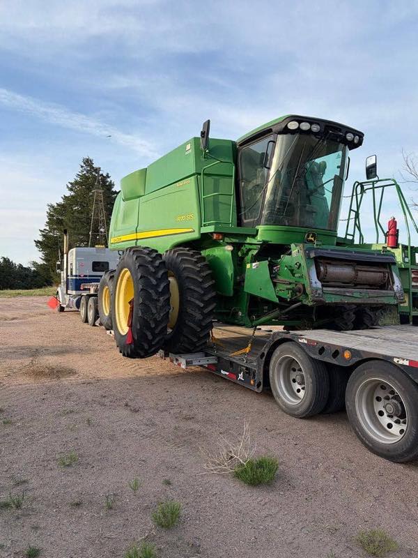 John Deere 9770 STS heading to the client