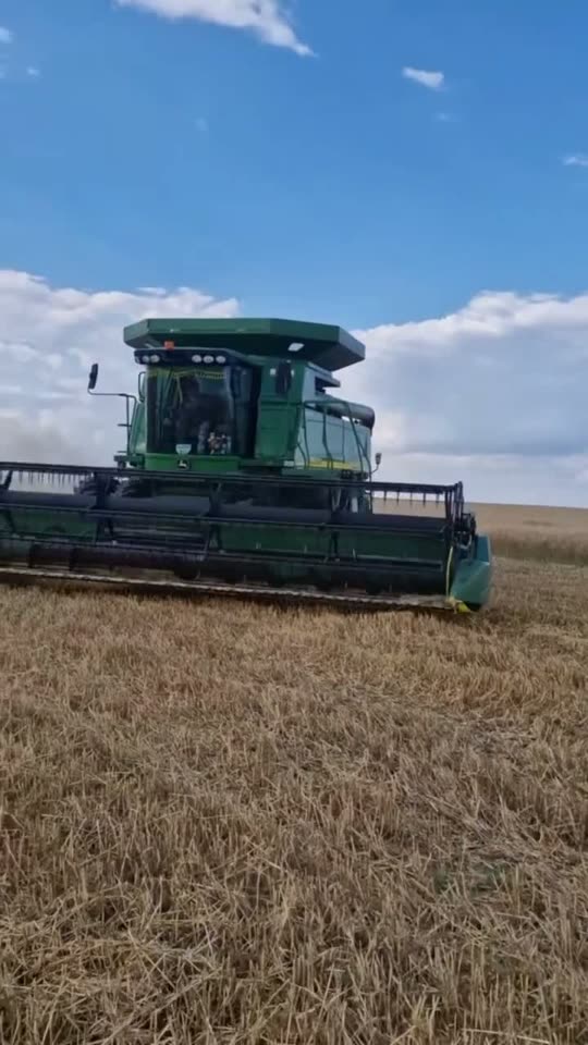 John Deere combine in the field